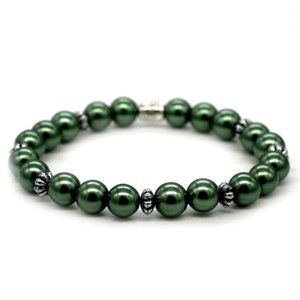 Olive green bracelet with silver spacers.